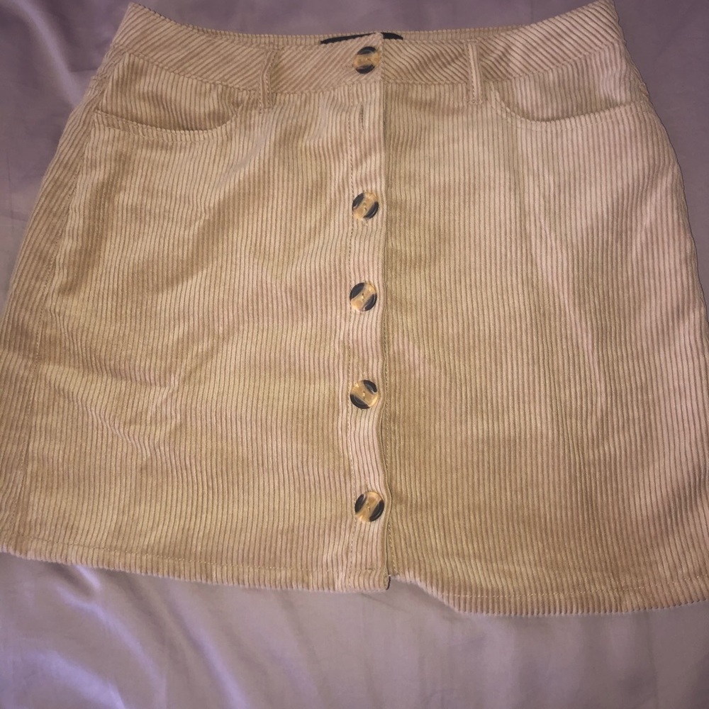 tan corduroy miniskirt with buttons !!